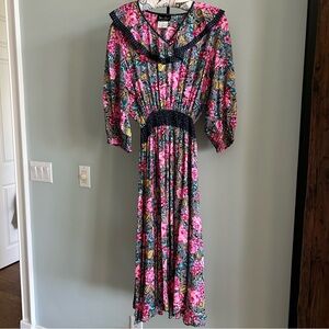 VINTAGE DIANE FREIS
FLORAL SMOCKED RUFFLE MIDI DRESS
